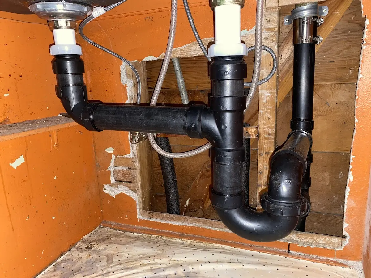 Professional Garbage Disposal Repair equipment and tools on the job in Monaca